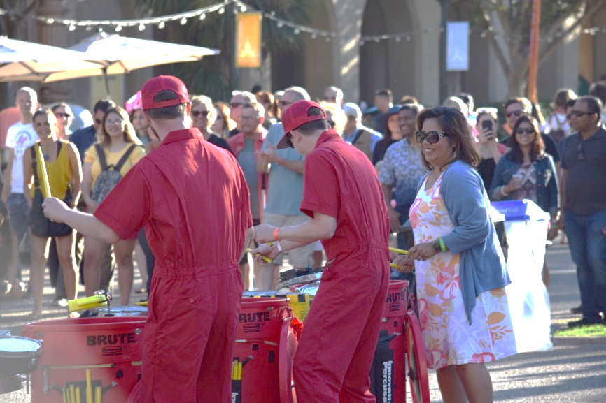 Woman drums with Thursday Night Party performers.