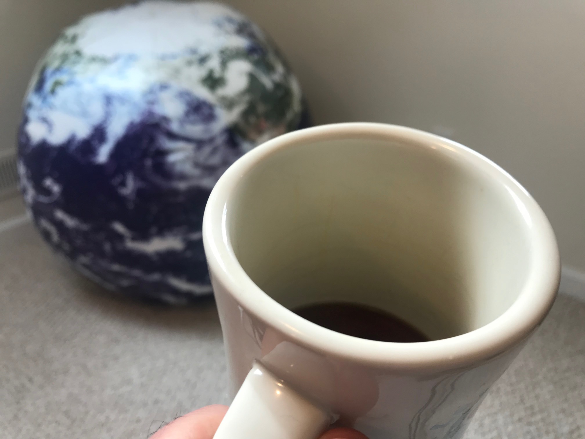 Coffee cup and globe 