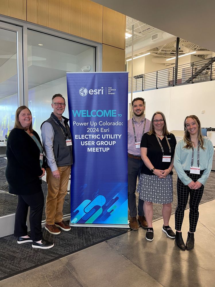 Group pic with banner.jpg