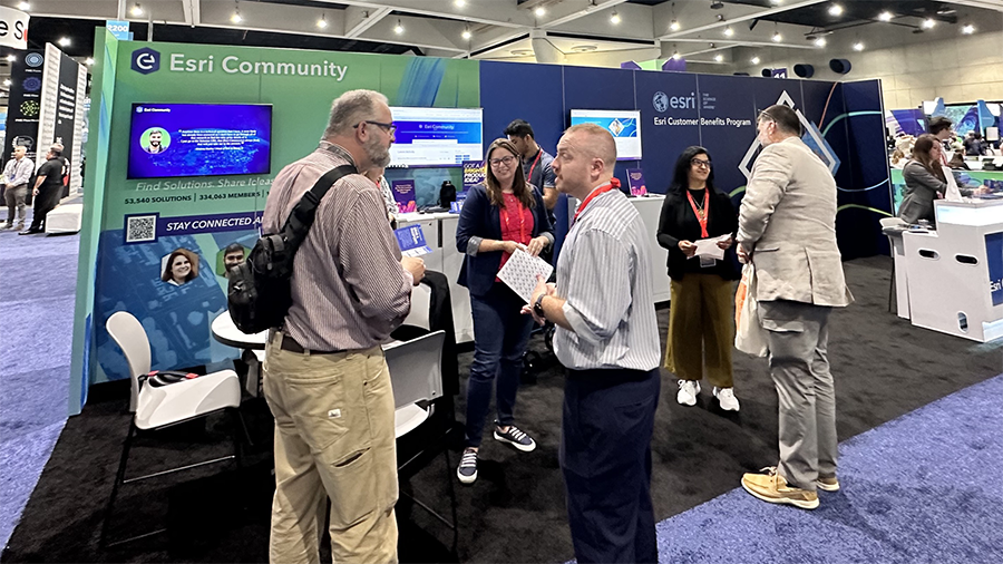 UC2023_EC Booth with Attendees.png