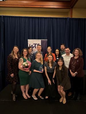 R.E.Y employees accepting the Women in Transportation (WTS) "Employer of the Year" Award
