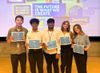 First place winning team holding their certificates.