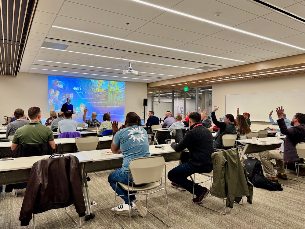 Brian Cross, Esri’s Executive Director of Professional Services, engaging with attendees