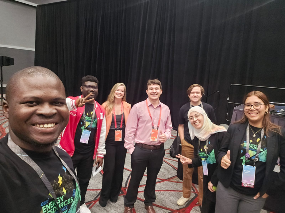 The student assistants with the young professional session speakers Danielle Powers and Justin Bires