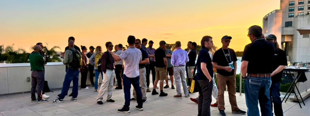 Attendees mingle on the terrace of the Marriott hotel in San Diego during the Esri UC Ag and Forestry Social