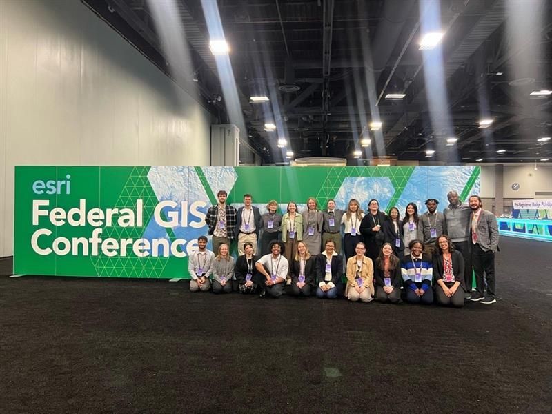 Adedayo with fellow student assistants at the 2024 FedGIS Conference and Xochitl Garcia and Joe Galarza - Student Assistant coordinators.