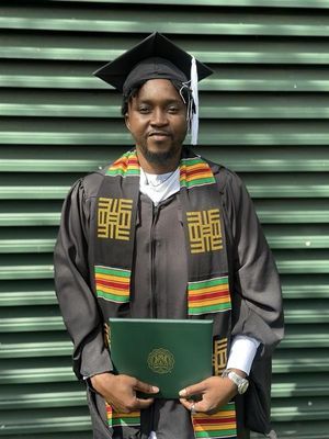 Adedayo Graduating with an MSc. from EMU