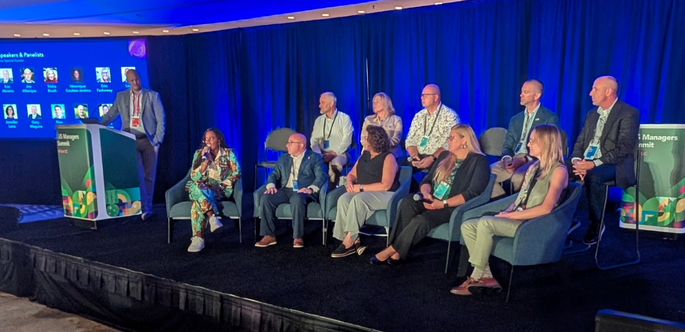 Panelists and presenters gathered on stage for Q&A at the end of the day at the GIS Managers Summit