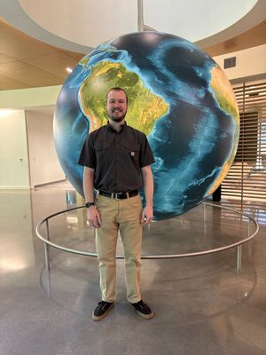 Me in front of the Iconic Globe at Esri Headquarters