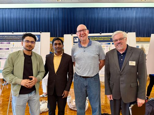 My two Presentation of research work at the Graduate School Research and Creative Activity Exhibition held at Eastern Illinois University, MLK Jr. University Union Grand Ballroom. Pictured are Graduate Assistant Prashant J. Karki, Krishna Daravath, Professor Dr. David Viertel, and Associate Dean & Professor Michael W. Cornebise, showcasing GIS research, collaboration, and academic engagement.