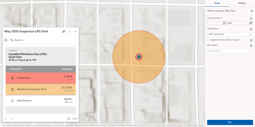 The Threat Analysis web tool’s appended output in Experience Builder. The inner circle (red) shows the fireball zone while the outer circle (orange) shows the mandatory evacuation zone for a liquefied petroleum gas threat