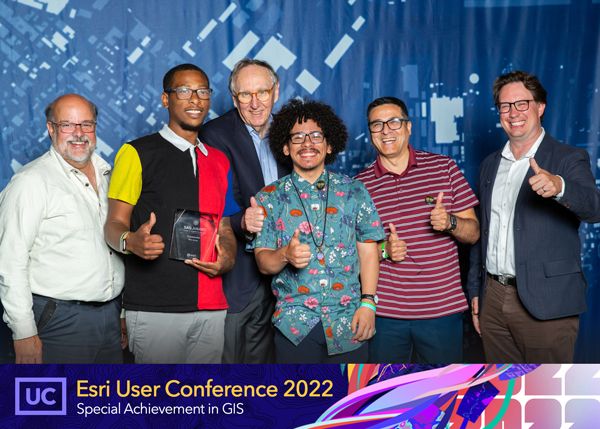 Hopeworks GIS Team leaders receive Special Achievement in GIS award from Jack Dangermond