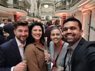 Esri YPN Board Members Zak Etem, Rosemary Boone, & Raquel Perez (left to right) with URISA Board of Directors Member, Sid Pandey (right)