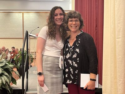 My academic advisor and I after I just presented an award to her during a banquet.